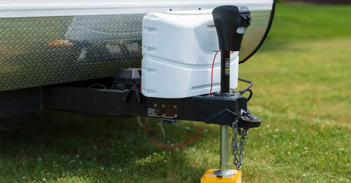 Trailer tongue jack and battery cover
