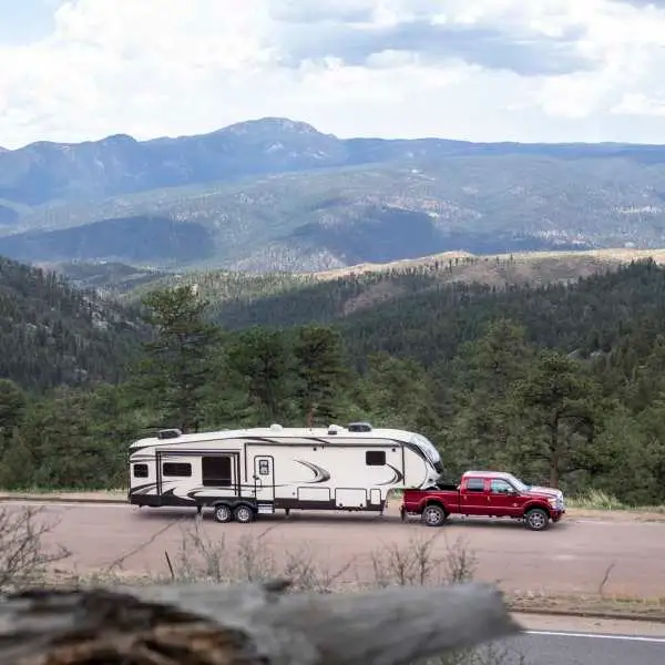 Fifth wheel trailer towed by truck