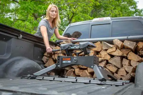 A25 5th Wheel Hitch in Truck Bed Woman Firewood