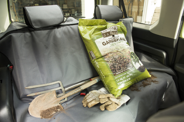 CURT Seat Defender™ bench seat cover with dirty tools