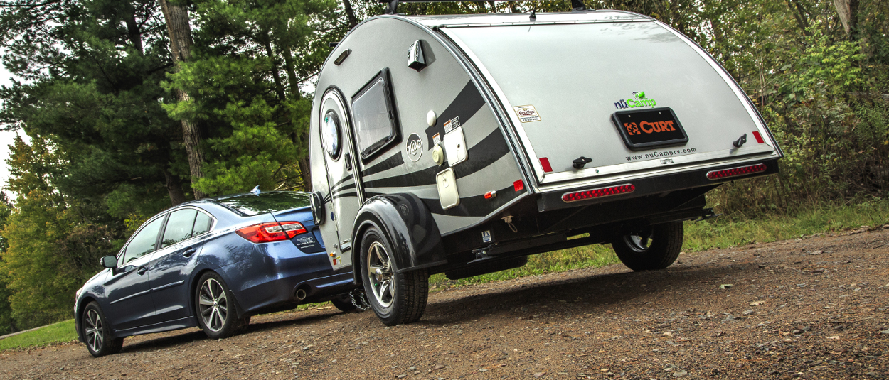 Car with class 1 hitch from CURT towing teardrop camper