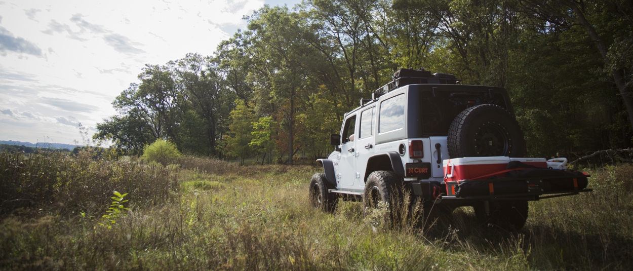 CURT cargo management cargo carrier on Jeep Wrangler