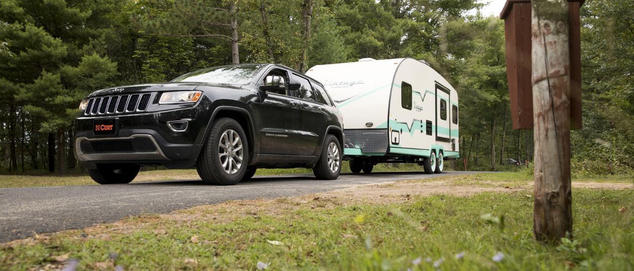 CURT class 3 trailer hitch on Jeep Cherokee towing camper