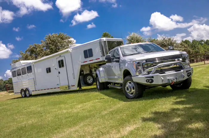 Farm Truck Towing Large Livestock Trailer