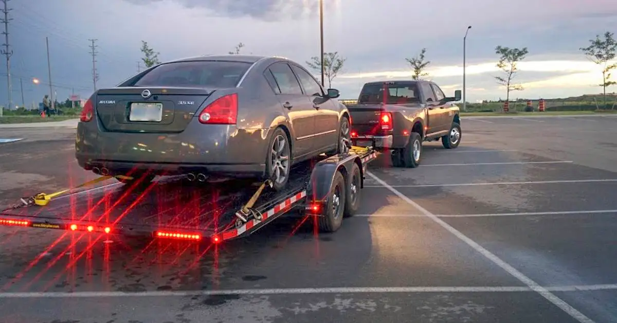 Trailer lights on car hauler towed by truck