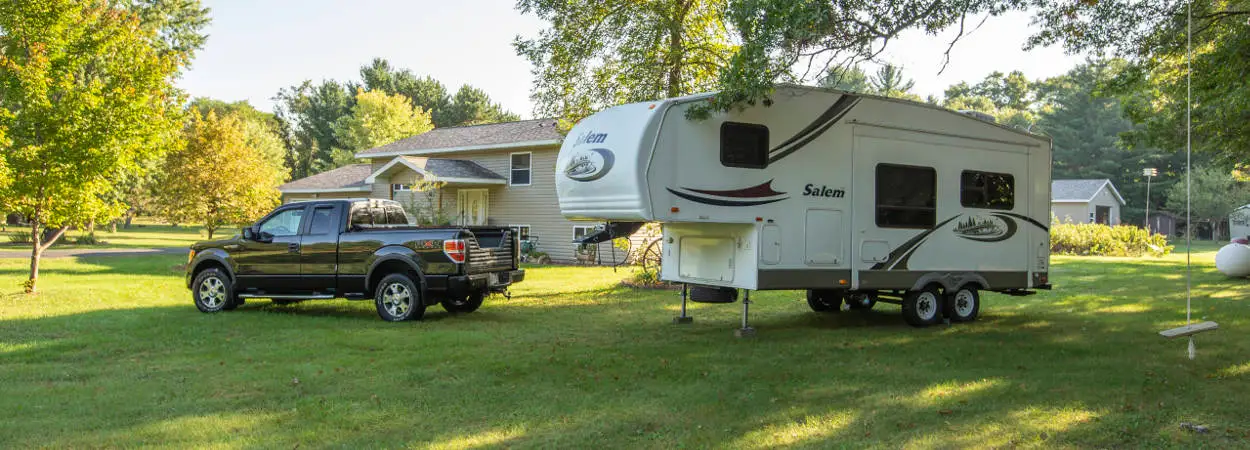 Unhitched 5th Wheel Trailer and Truck